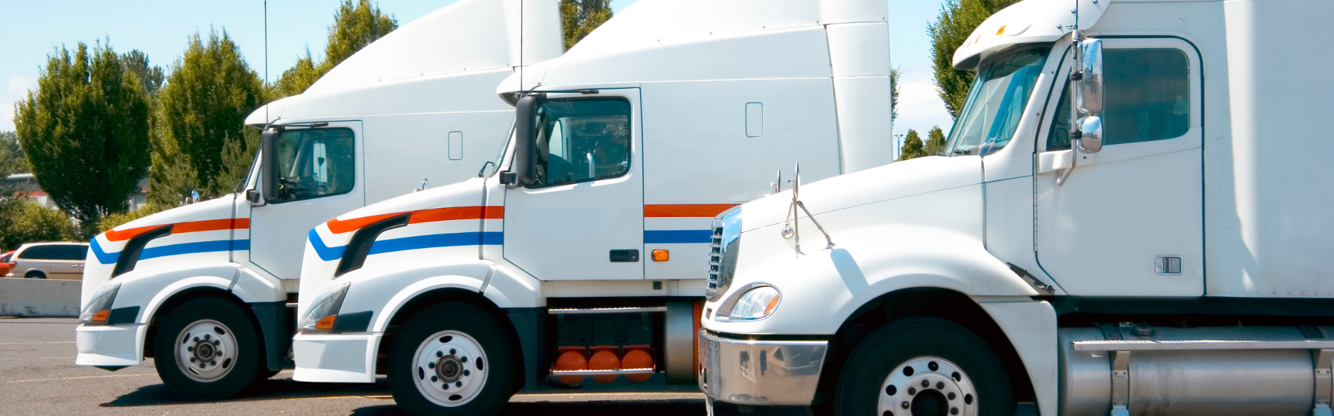 small fleet of three semi trucks