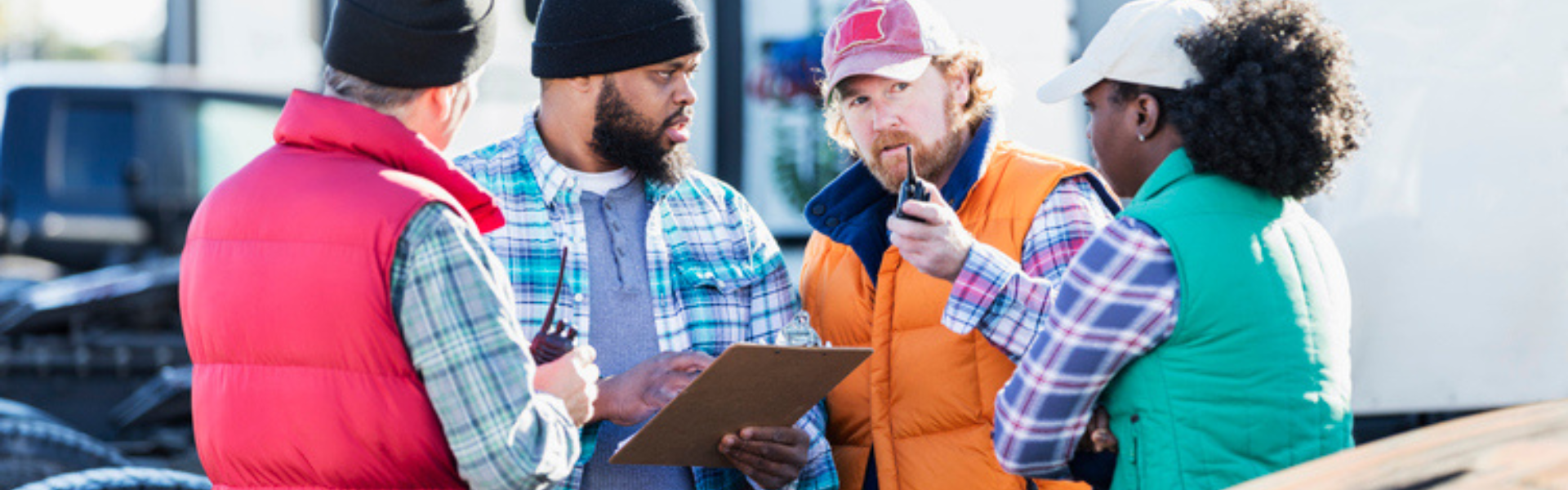 People gathered outside a truck stop