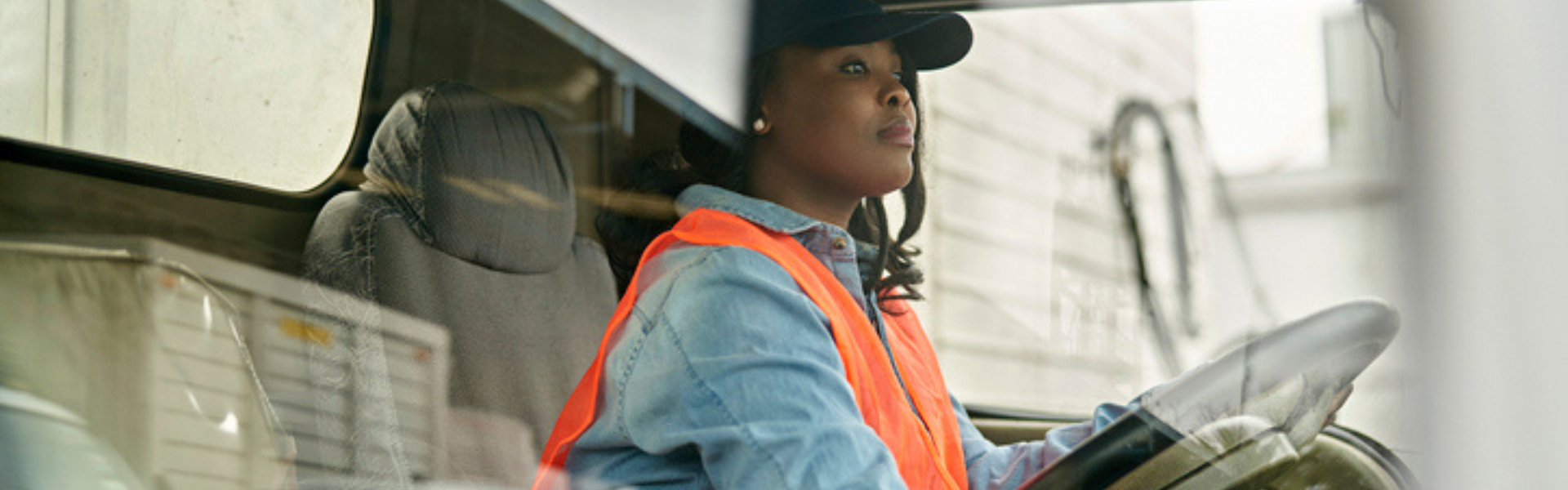 black woman driving semi truck
