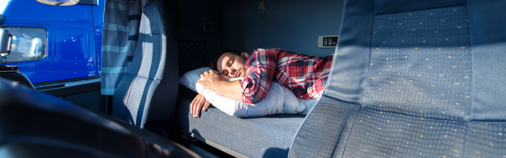 Trucker sleeping in cab