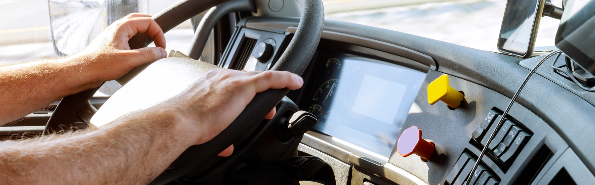 steering wheel and dash of semi truck