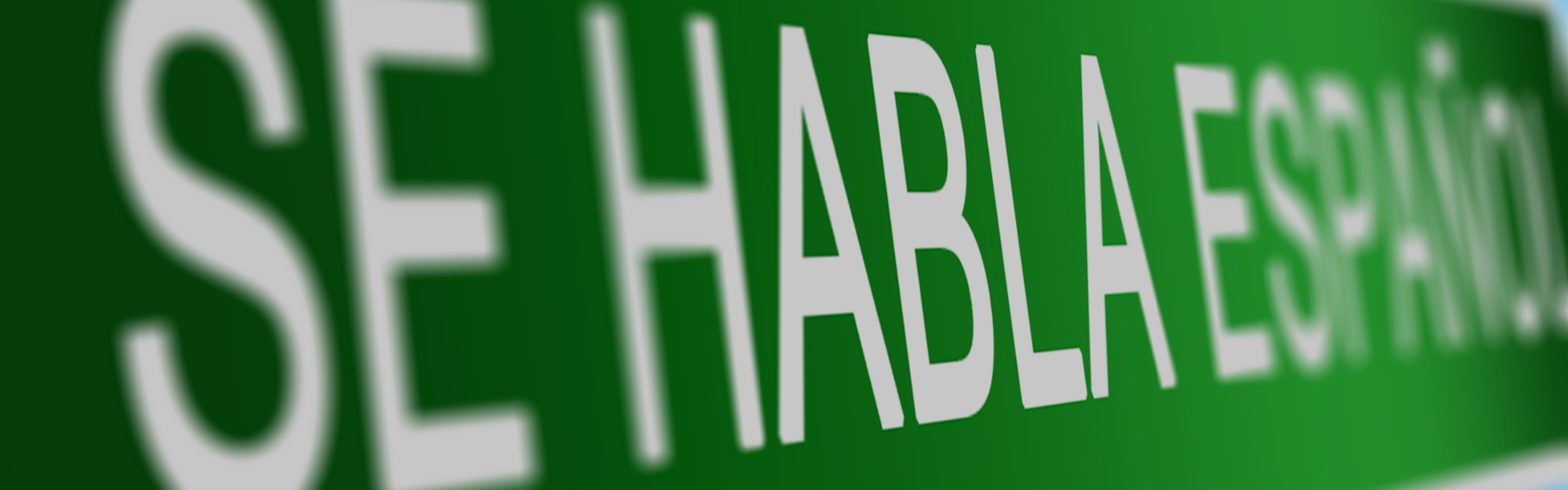 se habla espanol road sign