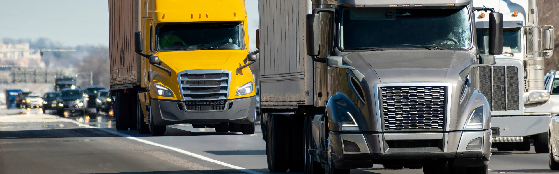 semi trucks on congested traffic road interstate