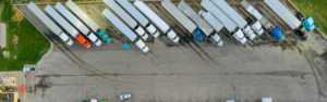 semi trucks parked in truck parking lot, truck parking, outpoast