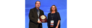 Source: Truckers News- 2023 Driver of the Year Joe Mondor (left) and Melissa Dixon (right), of the North Dakota Motor Carrier Association Board of Directors, at the annual NDMCA convention in Grand Forks