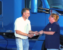 stacie simmons accepting landstar system inc 50th truck giveaway