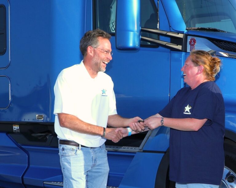 stacie simmons accepting landstar system inc 50th truck giveaway