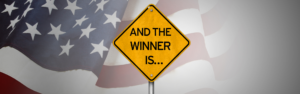 american flag and road sign that reads "and the winner is" keys to progress program, honoring veterans