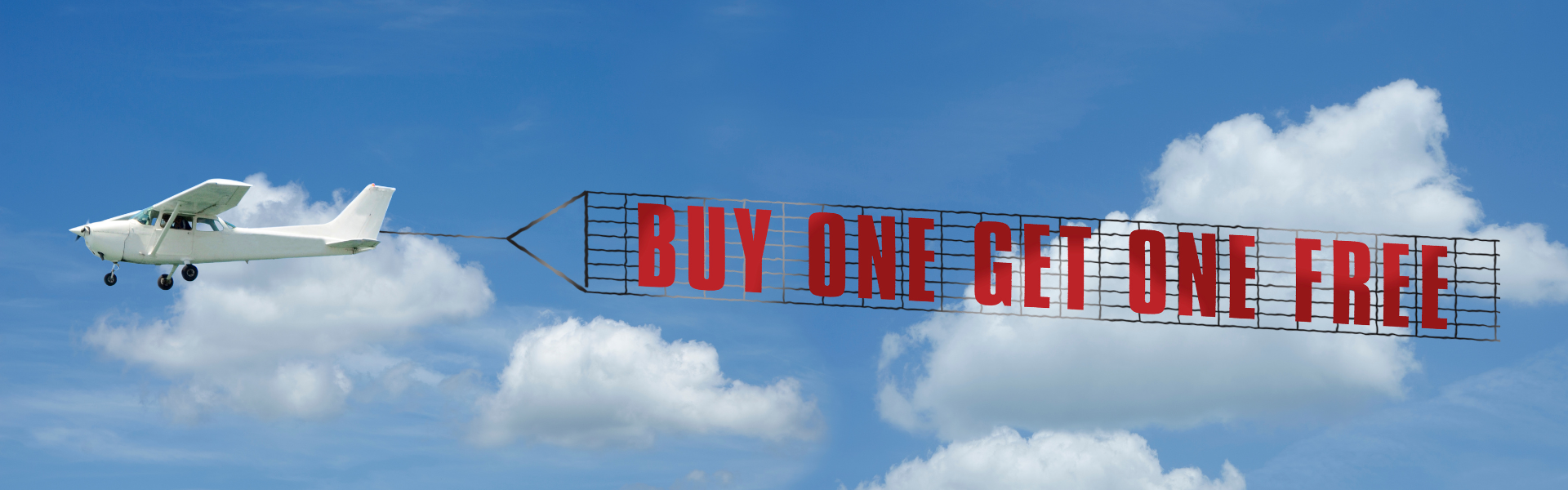 airplane pulling banner that reads "buy one get one free" Pilot's exclusive October BOGO deals through the myRewards Plus app