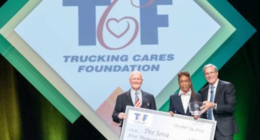 Dee Sova, a professional truck driver for Prime Inc., donates her $5,000 award from the Trucking Cares Foundation to Harmony House, a nonprofit in Springfield, Missouri, dedicated to supporting survivors of domestic violence.