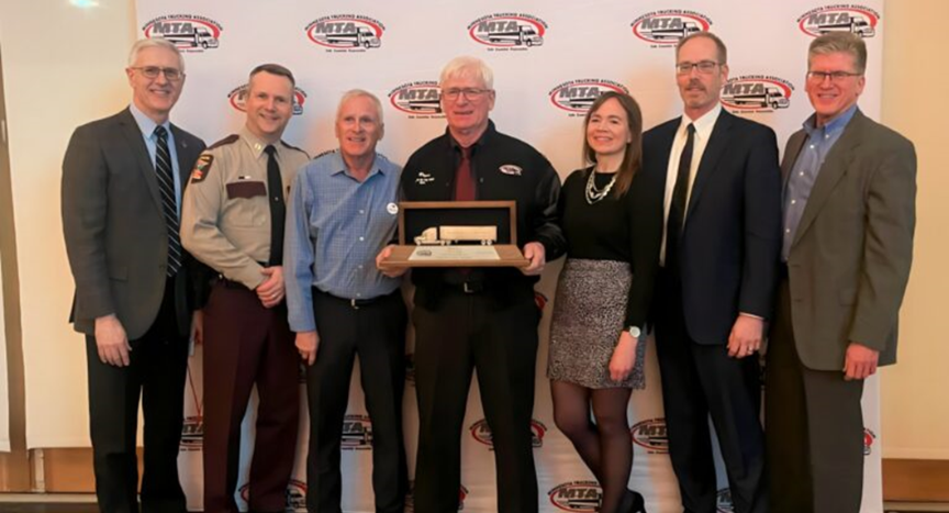 Roger Zima, a dedicated Foltz Trucking driver with over 4 million safe driving miles, has been named the 2024 Minnesota Driver of the Year by the Minnesota Trucking Association. Celebrate his outstanding achievements and commitment to excellence.