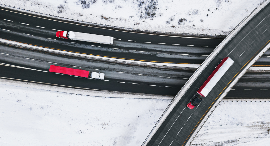 Trucks driving in winter weather. Prepare for winter roads with expert tips from seasoned truck drivers.