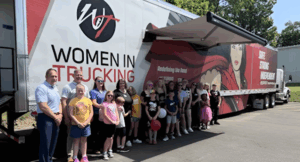 Kids Climb in the Cab at Aim’s Hands-On Trucking Career Day