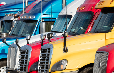 Semi trucks parked in a line. Don't miss the upcoming truck shows that every enthusiast will love!