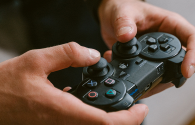 hands holding video game controller