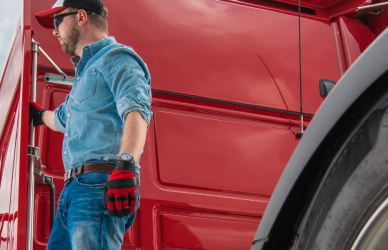 Man standing on semi truck