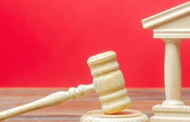 gavel on red background