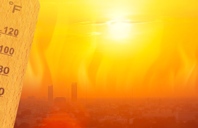 thermometer reading high temp with orange sunny background