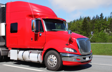 red semi truck on road