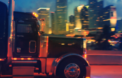 semi truck driving at night