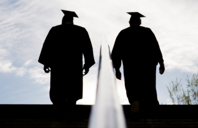 graduates walking up stairs