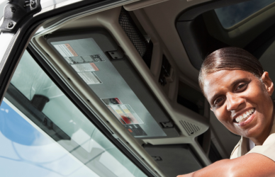 black woman driving semi truck