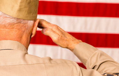 veteran saluting american flag