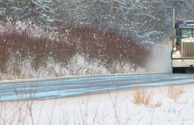 semi truck on snowy road