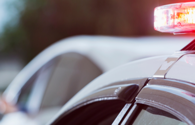 police car pulled over to side of road
