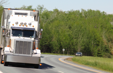 semi truck on curve in road