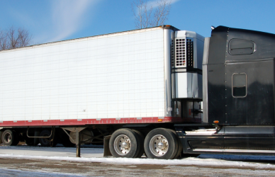 black semi truck with white trailer