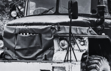 black and white photo of antique semi truck