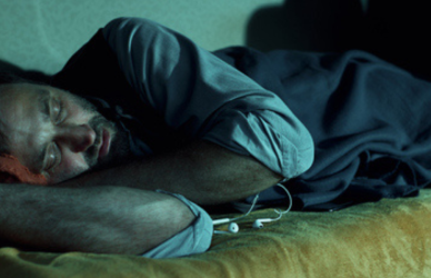 man in sleeper of semi truck