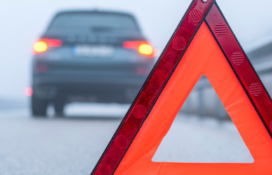 car pulled over with hazards on
