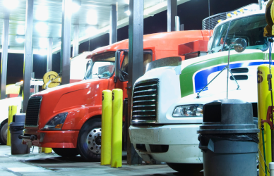 Trucks at fuel island at truck stop
