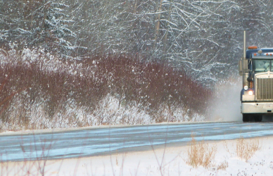 semi truck on snowy road