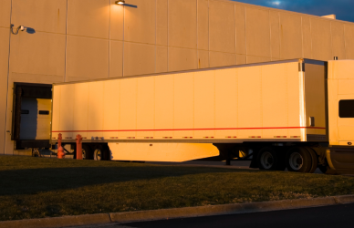 semi truck backed up to loading dock