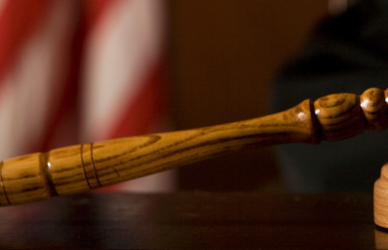 gavel with american flag in background