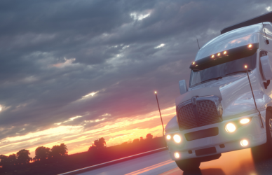 white semi truck in the sunset