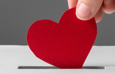 Placing paper heart in slot