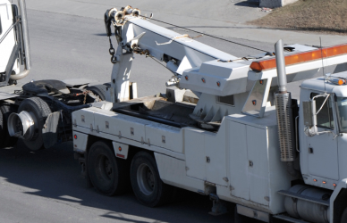 semi truck being towed