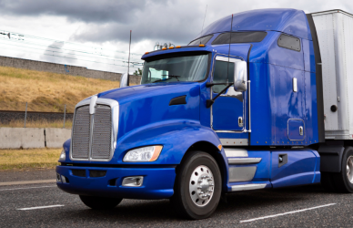 blue semi truck with underride guards