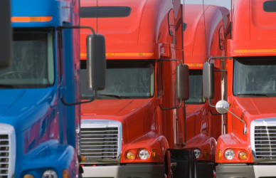orange and blue semi trucks