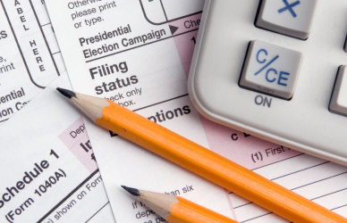 tax forms, calculator, pencils