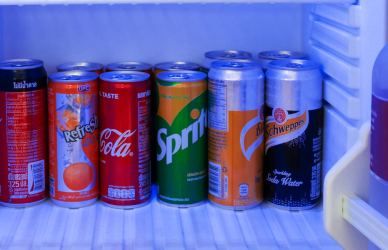 inside of a mini fridge filled with drinks