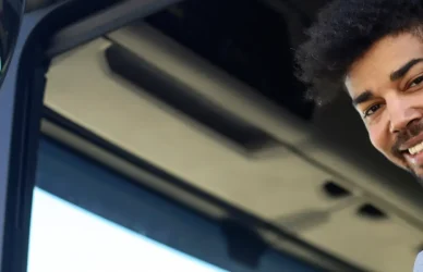 young black man driving semi truck
