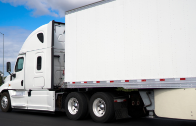 white semi truck with white trailer