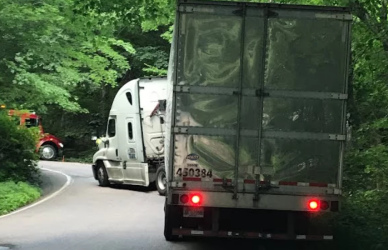 semi truck stuck in smugglers notch, vermont