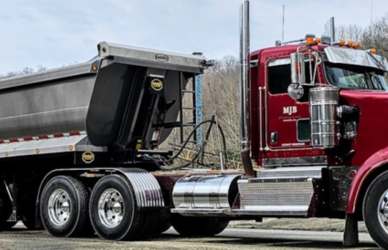 Patrick Tompkins 2012 Kenworth W900 with 2021 Steel Dump Quad