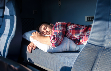 Trucker sleeping in cab